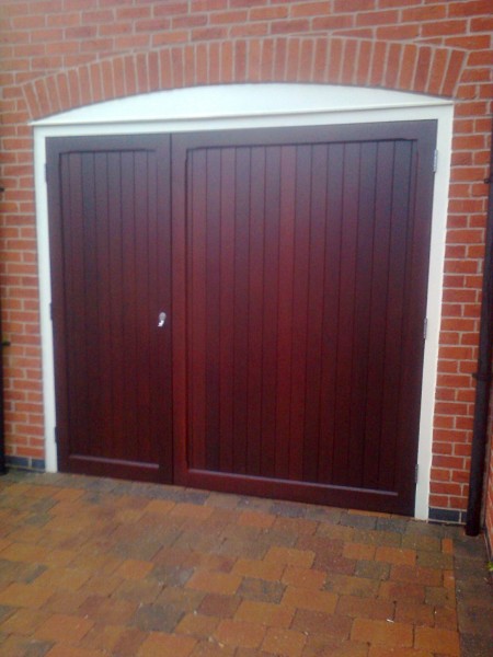 Side-hinged timber garage door