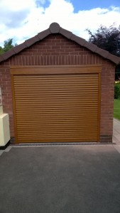 SWS compact roller door in Golden Oak