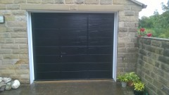 sectional door with wicket door